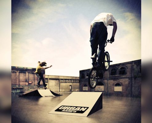 This is 3D rendered scene with photographs of a BMXer and Skater imposed on the shot.